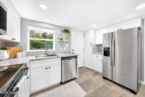 3448 Populatic Street, Mims FL - photo 10 of 34