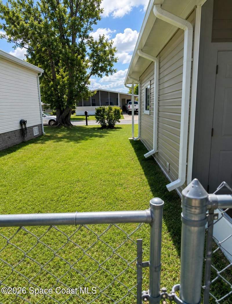 3 bedroom Manufactured Home at 1109 Wren Circle, Barefoot Bay Unit 2 Part 10, Barefoot Bay — photo 5