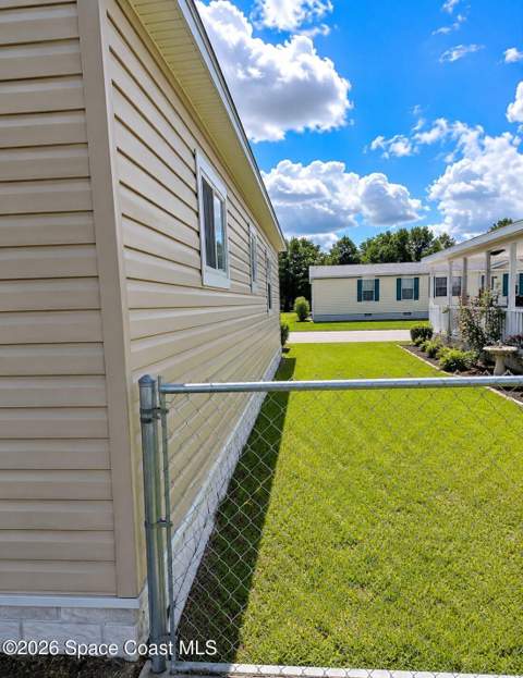 1109 Wren Circle, Barefoot Bay FL - photo 6 of 23