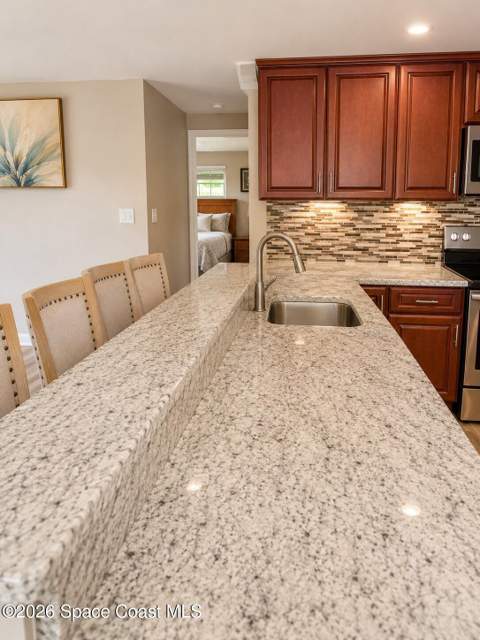 1109 Wren Circle, Barefoot Bay FL - photo 10 of 23