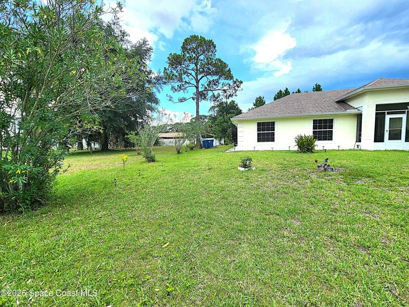 4 bedroom Single Family Residence at 622 SW Weaver Road, Port Malabar Unit 20, Palm Bay — photo 4