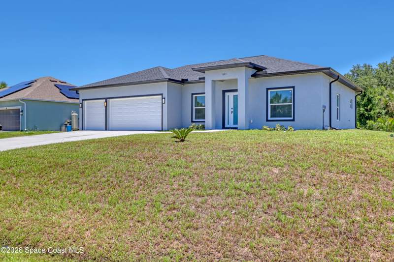 4 bedroom Single Family Residence at 601 Yardley Street, Port Malabar Unit 49, Palm Bay — photo 5