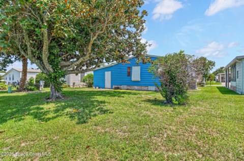 730 Periwinkle Circle, Barefoot Bay FL - photo 7 of 62