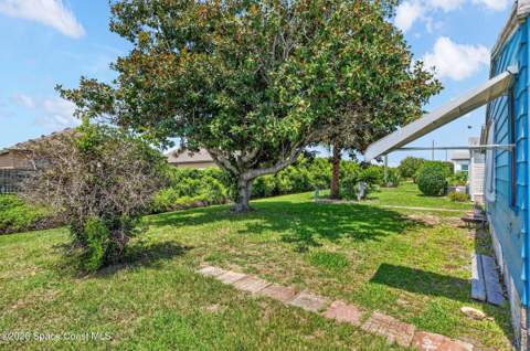 730 Periwinkle Circle, Barefoot Bay FL - photo 8 of 62