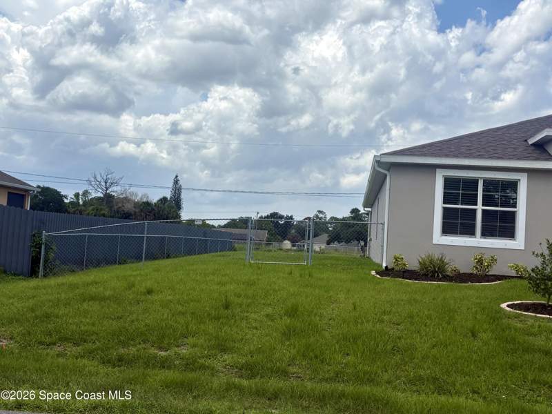 4 bedroom Single Family Residence at 859 Serenade Street, Port Malabar Unit 14, Palm Bay — photo 3