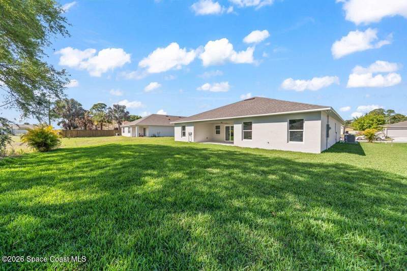 4 bedroom Single Family Residence at 449 Wells Avenue, Port Malabar Unit 20, Palm Bay — photo 2
