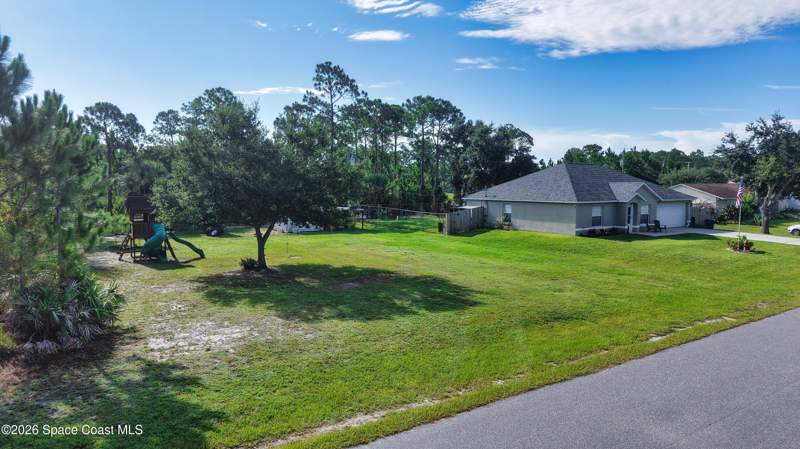 3 bedroom Single Family Residence at 3027 Langmaid Avenue, Port Malabar Unit 25, Palm Bay — photo 2