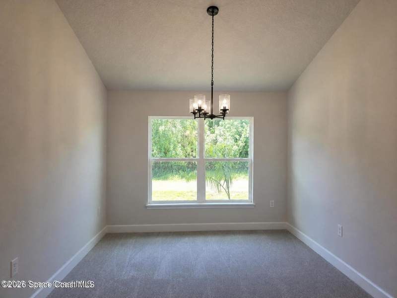 4 bedroom Single Family Residence at 403 J.a. Bombardier Boulevard, Port Malabar Unit 32, Palm Bay — photo 2