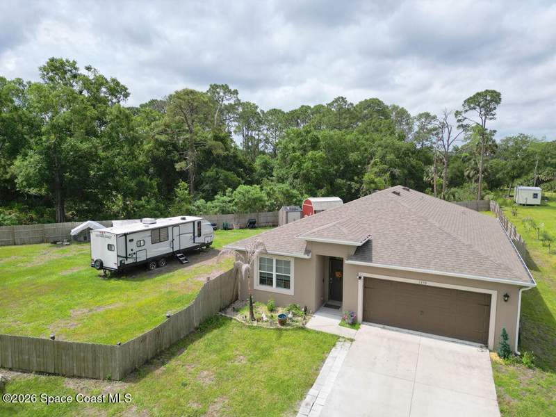 4 bedroom Single Family Residence at 1358 Zanzibar Road, Port Malabar Unit 16, Palm Bay — photo 2