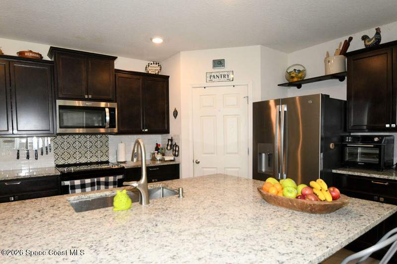 4 bedroom Single Family Residence at 1358 Zanzibar Road, Port Malabar Unit 16, Palm Bay — photo 4