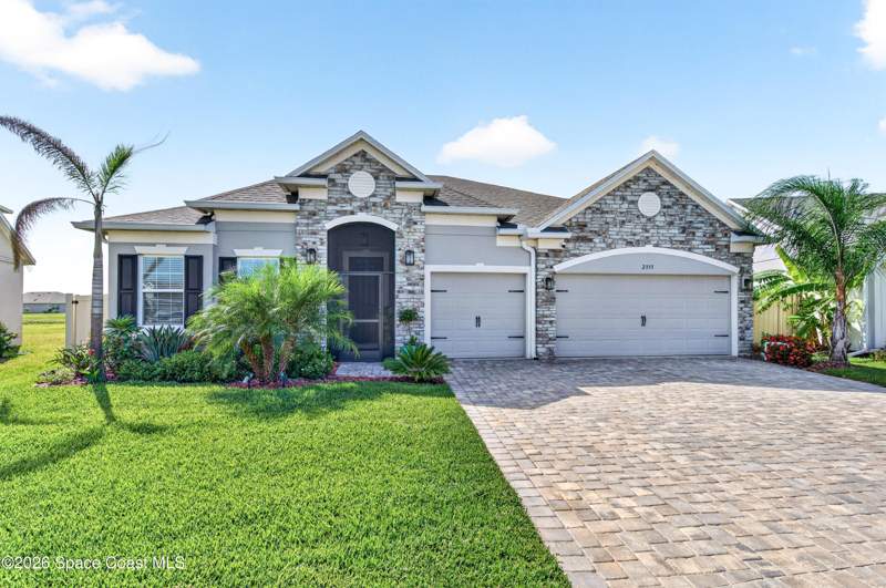4 bedroom Single Family Residence at 2393 Middlebury Drive, Courtyards At Waterstone Ph II, Palm Bay — photo 2