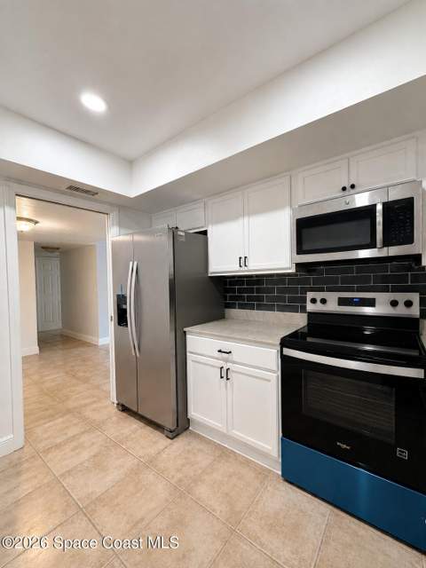 223 Columbia Drive #102, Cape Canaveral FL - photo 6 of 39