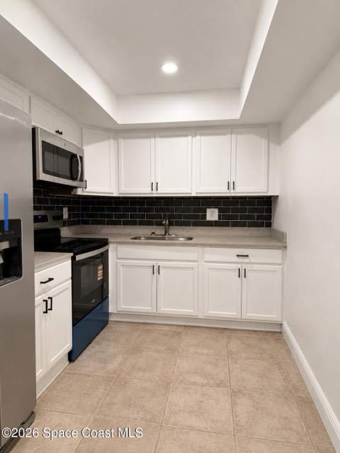 223 Columbia Drive #102, Cape Canaveral FL - photo 9 of 39