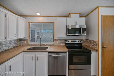 451 E Egret Circle, Barefoot Bay FL - photo 13 of 72