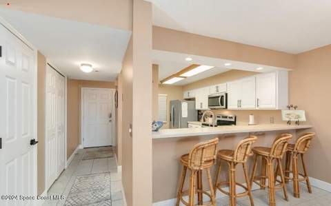 1050 N Atlantic Avenue #106, Cocoa Beach FL - photo 12 of 57