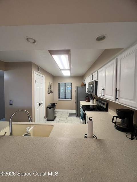 1050 N Atlantic Avenue #106, Cocoa Beach FL - photo 8 of 57