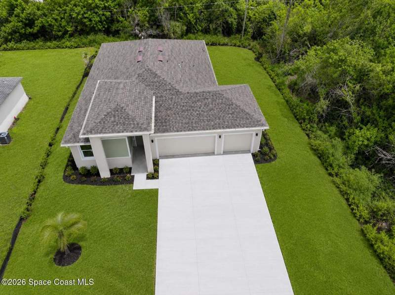 4 bedroom Single Family Residence at 371 Halloran Street, Port Malabar Unit 25, Palm Bay — photo 4