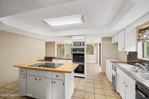 1320 S Carpenter Road, Titusville FL - photo 12 of 55