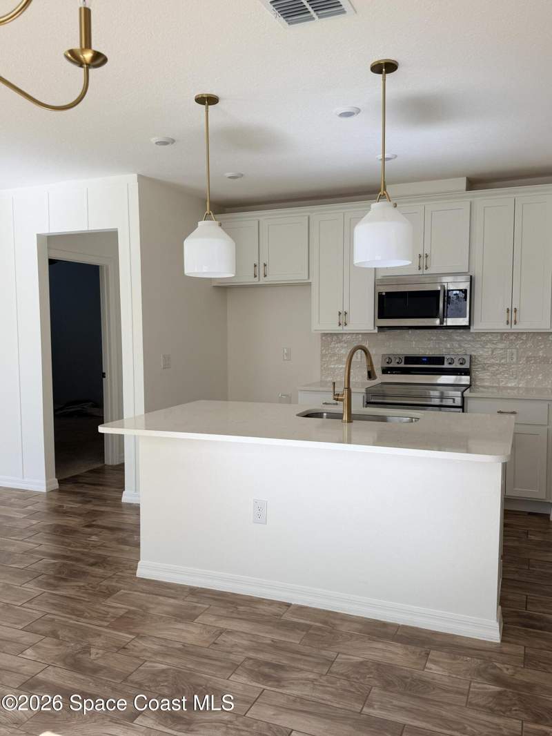 5 bedroom Single Family Residence at 1212 Canfield Circle, Gardens At Waterstone Phase 1, Palm Bay — photo 4