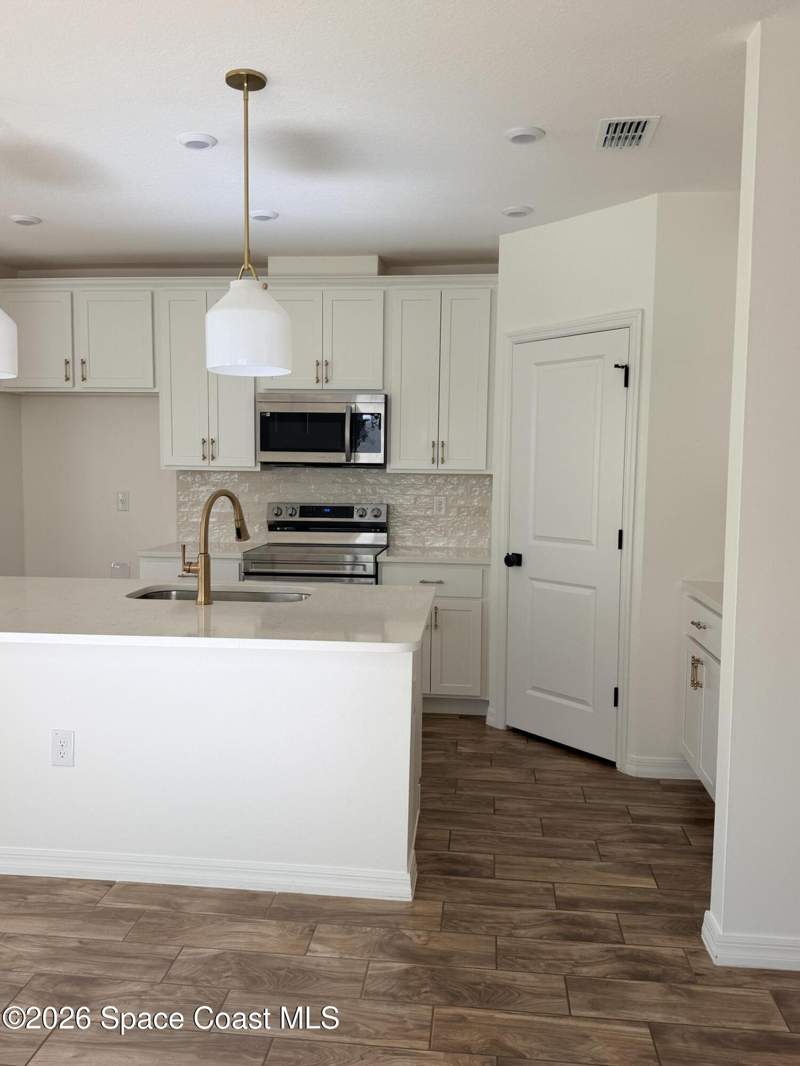 5 bedroom Single Family Residence at 1212 Canfield Circle, Gardens At Waterstone Phase 1, Palm Bay — photo 5