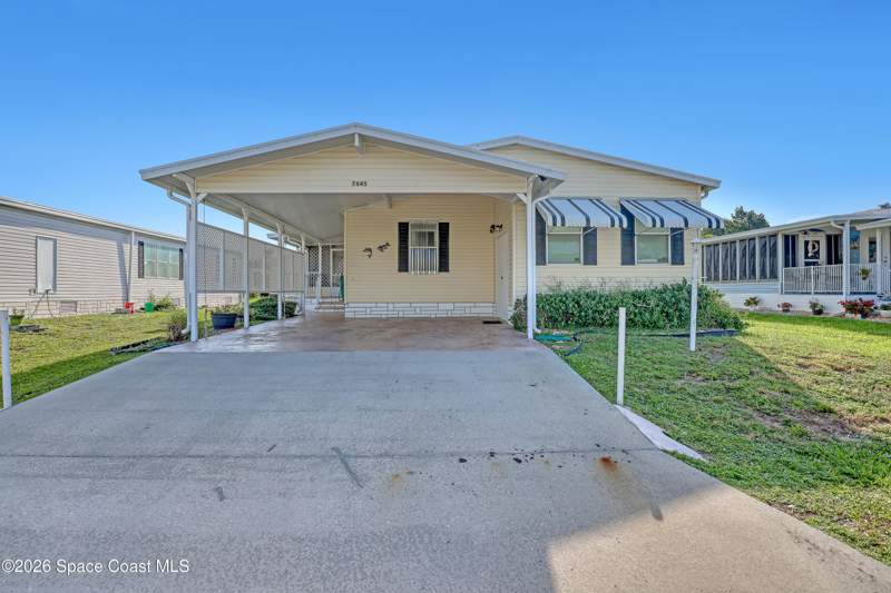 2 bedroom Manufactured Home at 7645 Cedar Bark Road, Snug Harbor Lakes Condo, Micco — photo 2