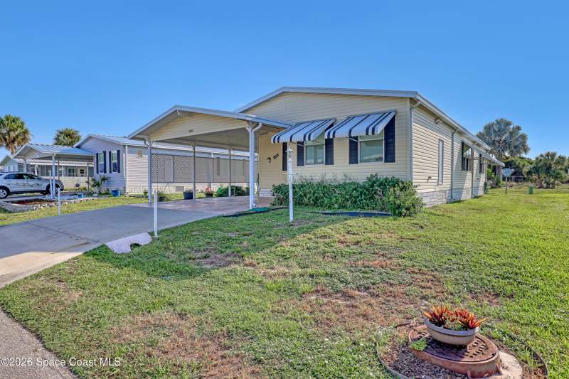 2 bedroom Manufactured Home at 7645 Cedar Bark Road, Snug Harbor Lakes Condo, Micco — photo 1