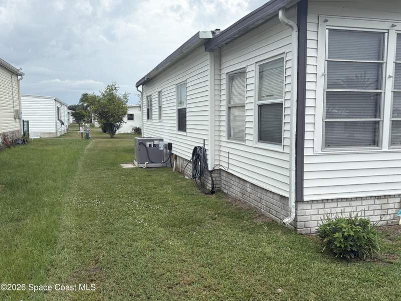 2 bedroom Manufactured Home at 1153 Waterway Drive, Barefoot Bay Unit 2 Part 10, Barefoot Bay — photo 5