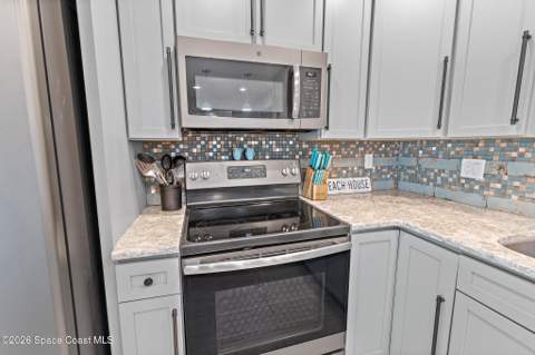 8767 Live Oak Court, Cape Canaveral FL - photo 6 of 40