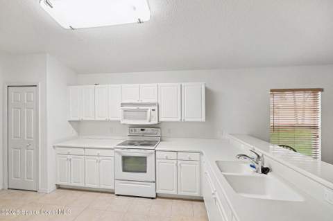 952 Tavernier Circle, Palm Bay FL - photo 10 of 37
