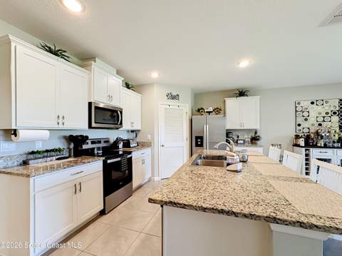 6935 Topaz Drive, Grant-Valkaria FL - photo 7 of 48
