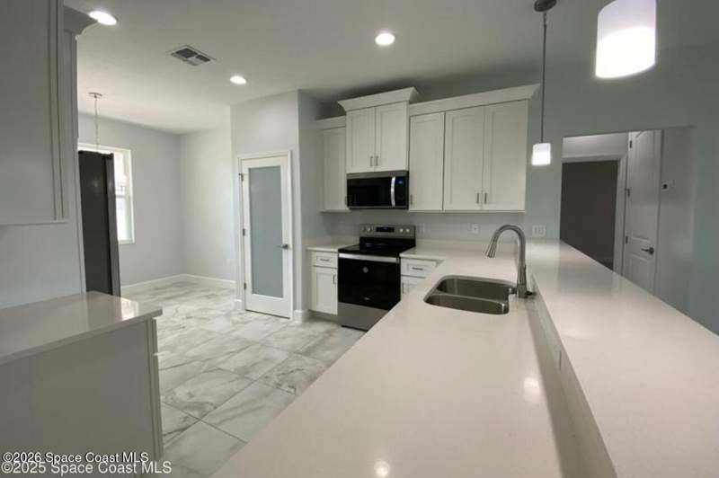 4 bedroom Single Family Residence at 2685 Hester Avenue, Port Malabar Unit 46, Palm Bay — photo 5