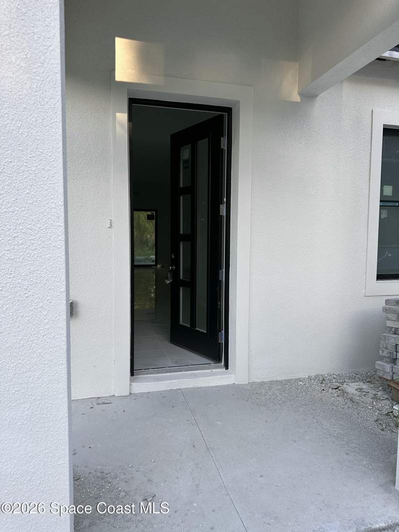 4 bedroom Single Family Residence at 390 Tamarind Circle, Port Malabar Unit 41, Palm Bay — photo 2
