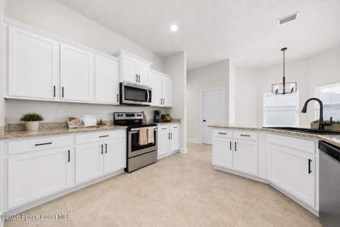 526 J A Bombardier Boulevard, Palm Bay FL - photo 8 of 20