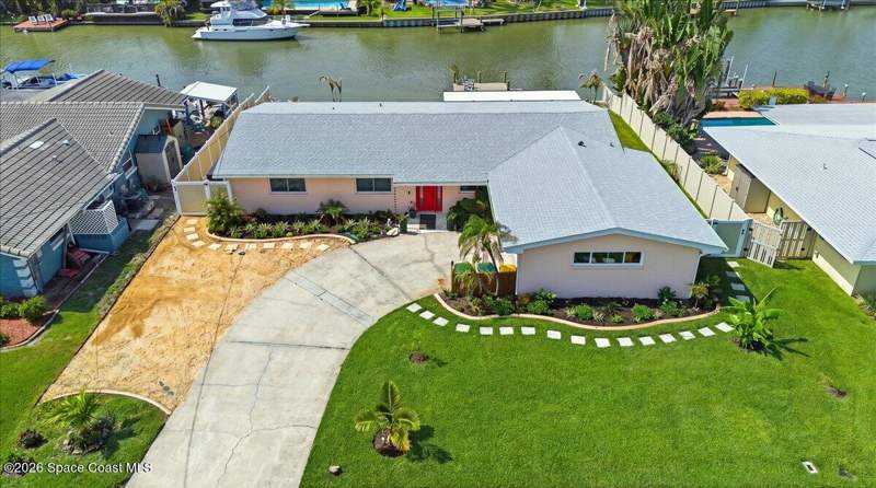 4 bedroom Single Family Residence at 116 Jamaica Drive, Cocoa Isles 7th Addn, Cocoa Beach — photo 2
