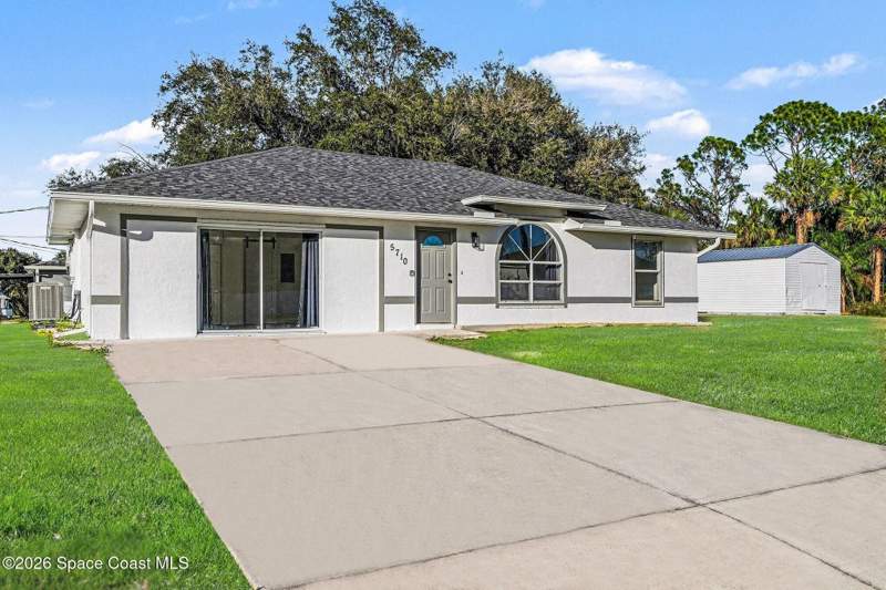 4 bedroom Single Family Residence at 5710 Graham Street, Port St John Unit 7, Cocoa — photo 2
