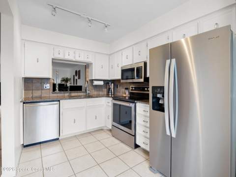 125 Kristi Drive, Indian Harbour Beach FL - photo 12 of 36