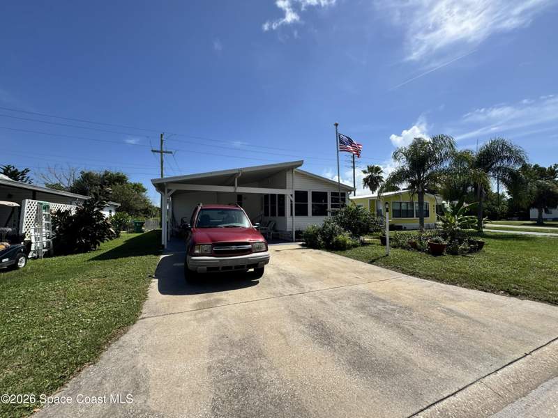 3 bedroom Manufactured Home at 835 Vireo Drive, Barefoot Bay Unit 2 Part 13, Barefoot Bay — photo 2