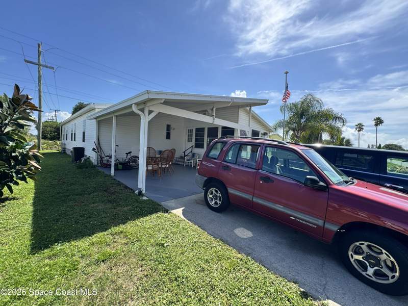 3 bedroom Manufactured Home at 835 Vireo Drive, Barefoot Bay Unit 2 Part 13, Barefoot Bay — photo 5