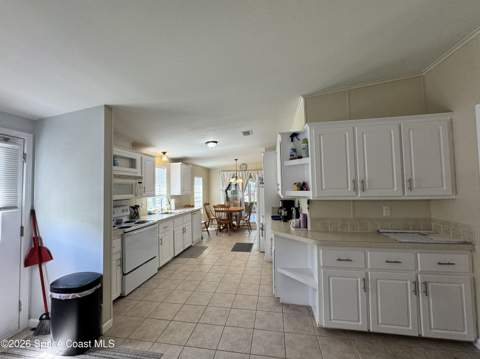 835 Vireo Drive, Barefoot Bay FL - photo 12 of 35