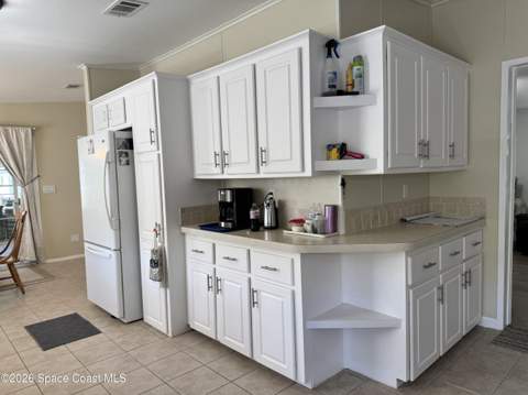835 Vireo Drive, Barefoot Bay FL - photo 18 of 35