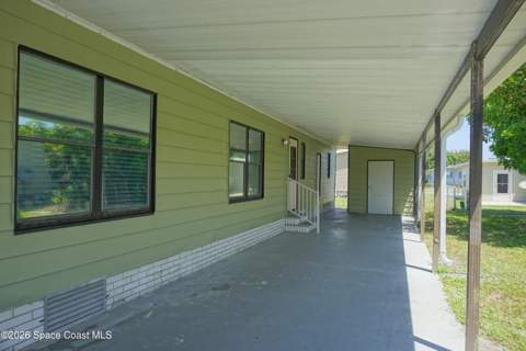 434 Royal Tern Drive, Barefoot Bay FL - photo 7 of 33