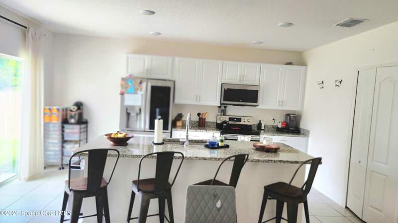 4 bedroom Single Family Residence at 1051 Pope Street, Port Malabar Unit 42, Palm Bay — photo 3