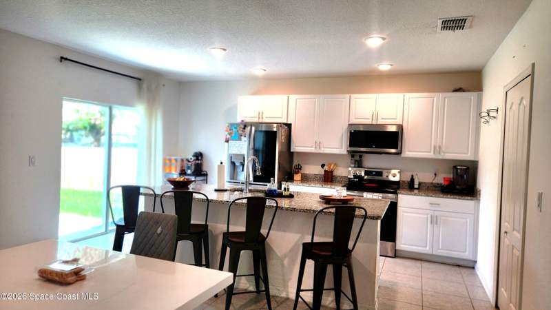 4 bedroom Single Family Residence at 1051 Pope Street, Port Malabar Unit 42, Palm Bay — photo 4