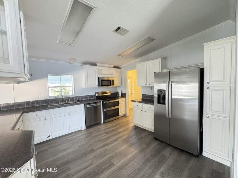 3 bedroom Mobile Home at 1001 Waterway Drive, Barefoot Bay Unit 2 Part 10, Barefoot Bay — photo 5