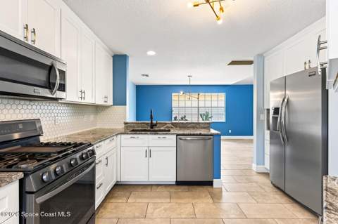 1599 Pga Boulevard, Melbourne FL - photo 7 of 32