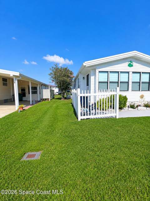 920 Hyacinth Circle, Barefoot Bay FL - photo 6 of 29