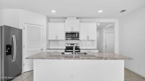 7114 Topaz Drive, Grant-Valkaria FL - photo 8 of 53