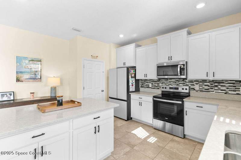 4 bedroom Single Family Residence at 4718 Alligator Flag Circle, Sawgrass Lakes The Landings, West Melbourne — photo 2