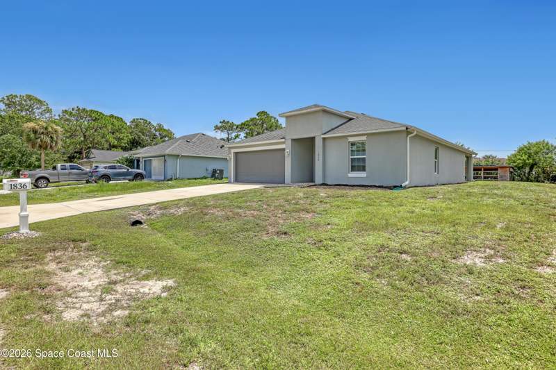 4 bedroom Single Family Residence at 1836 Andover Street, Port Malabar Unit 44, Palm Bay — photo 3
