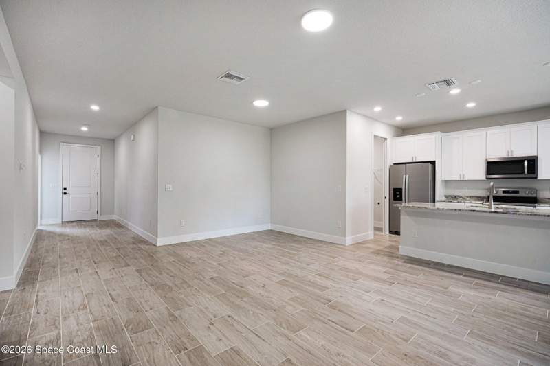 4 bedroom Single Family Residence at 879 Wisham Street, Port Malabar Unit 49, Palm Bay — photo 4
